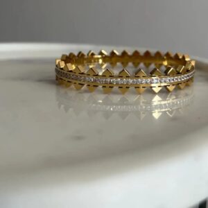 aurora bangle with crystals in ceter