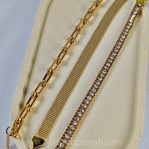 Stackable gold bracelet set for women – link, mesh, and crystal design