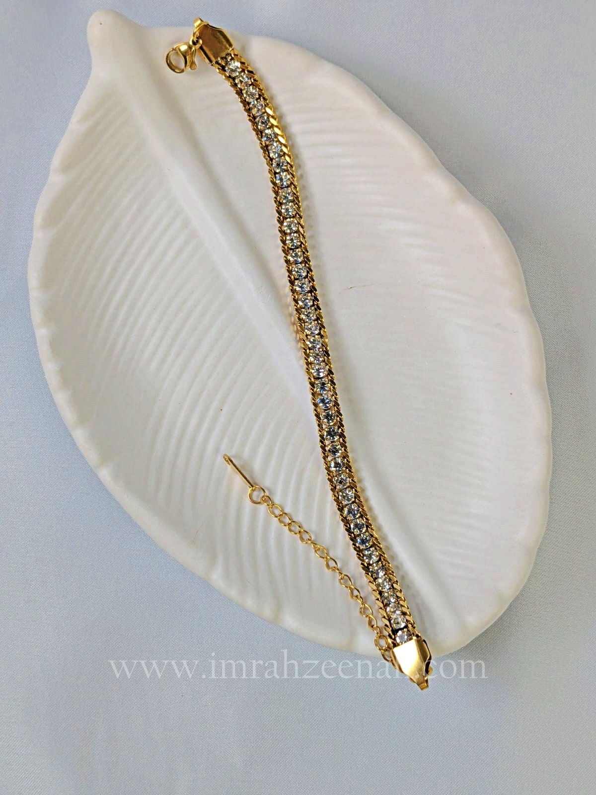 Tennis Style Bracelet with Gold Plating and Sparkling Crystals