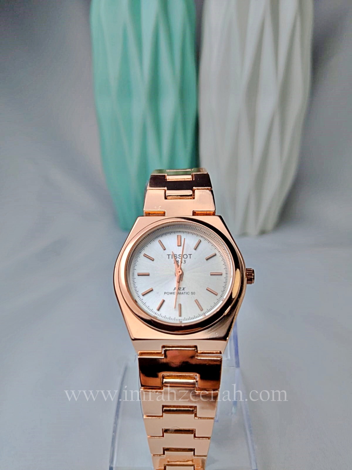 Tissot-style rose gold stainless steel watch with quartz movement and butterfly clasp