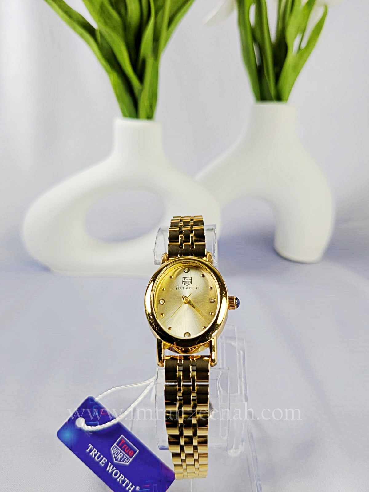 TW Aeri oval watch stainless steel with butterfly clasp gold color