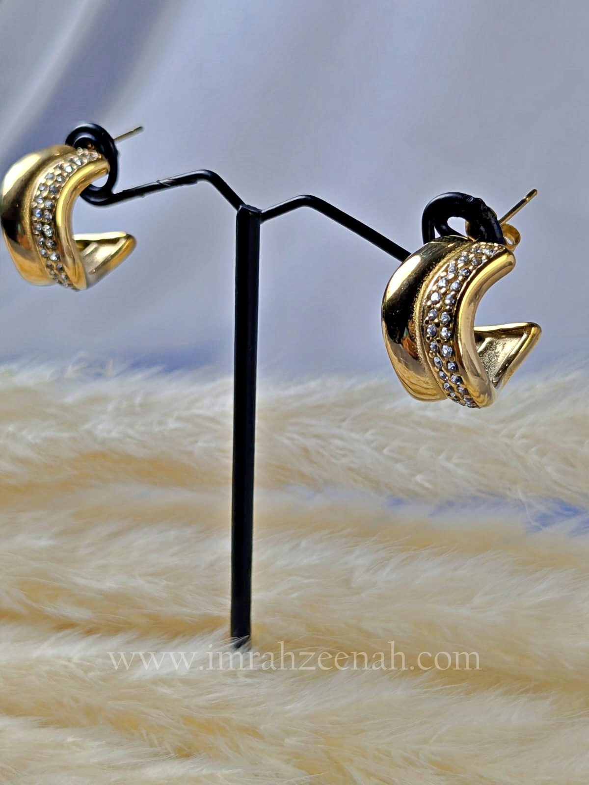 Wave Curve Gold Hoop Earrings with sparkling stones in elegant gold finish.