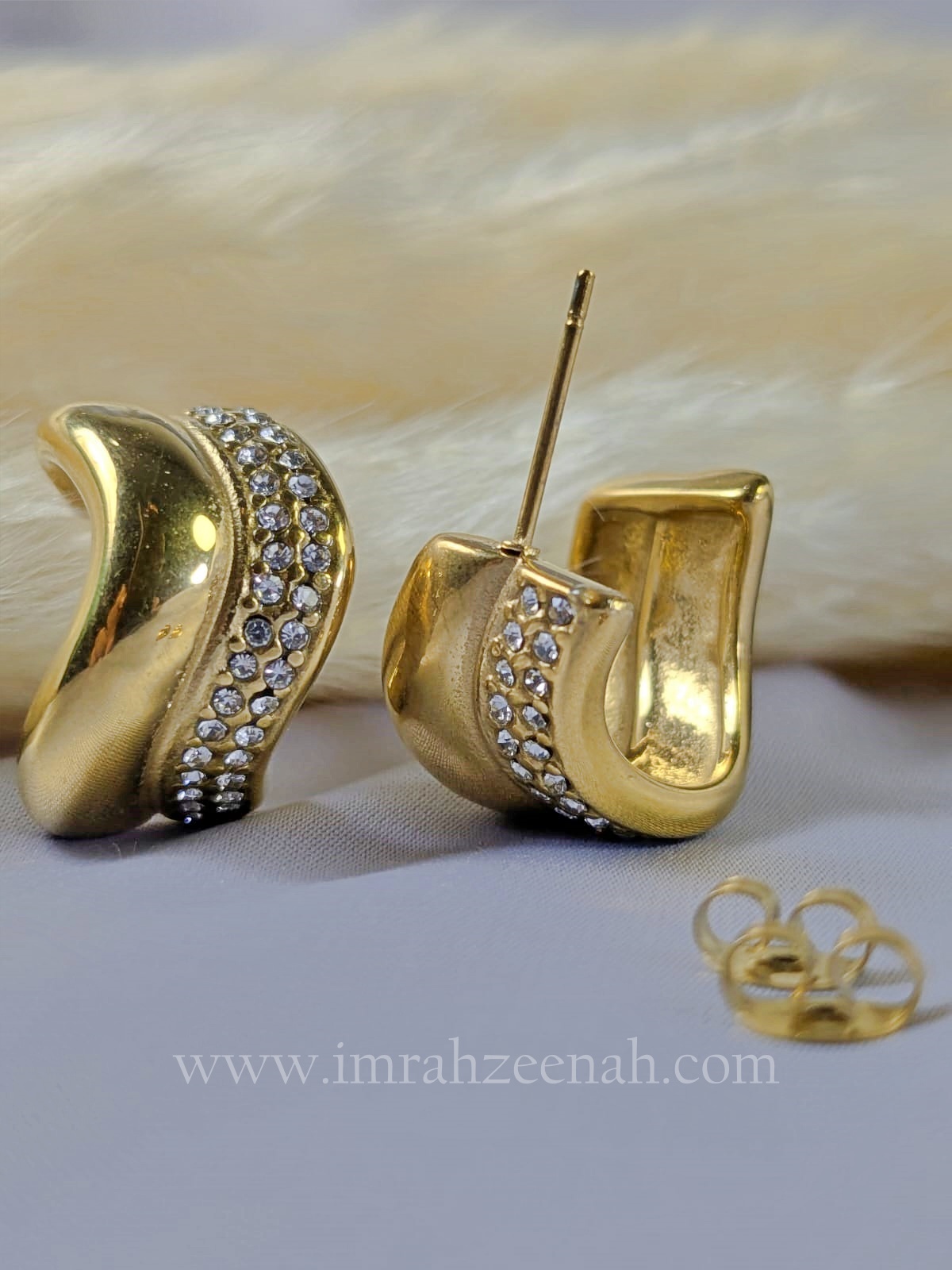 Wave Curve Gold Hoop Earrings with sparkling stones in elegant gold finish.