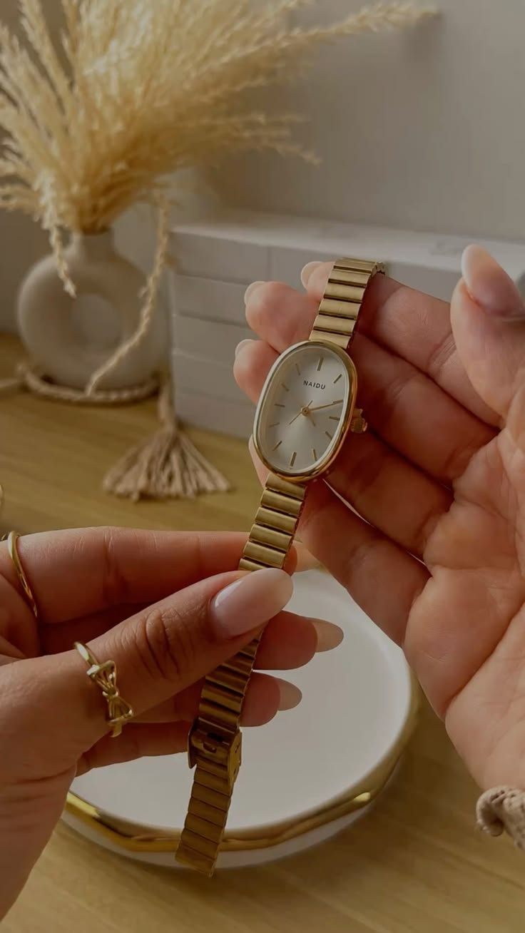 Naidu golden sleek elegant watch